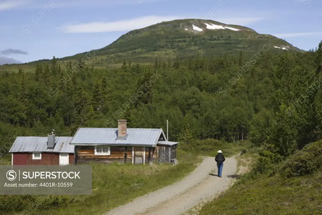 A woman hiking in the Swedish mountians, Harjedalen, Sweden.