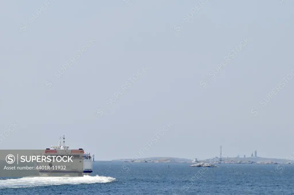 Scandinavia, Sweden, Gothenburg, Vastkusten, View of ferry in sea