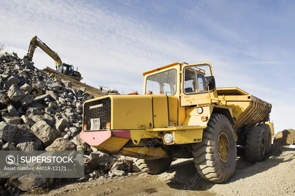 Excavator and a dumper truck