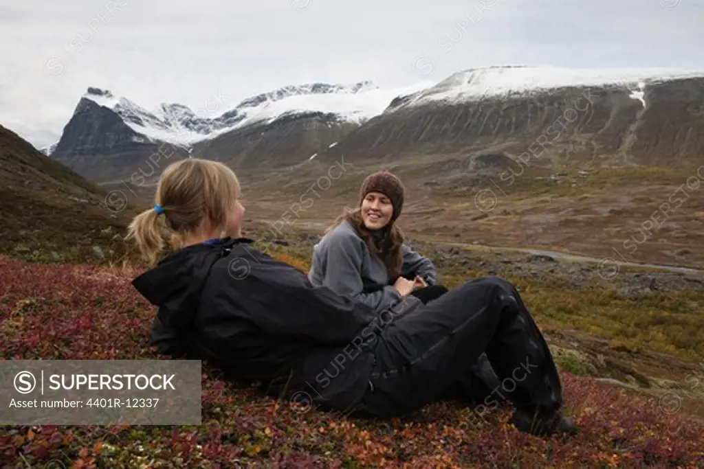 Two people on a mountain tour having a break, Sweden.