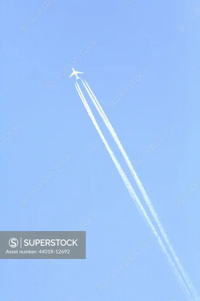 Airplane against a blue sky, Sweden.