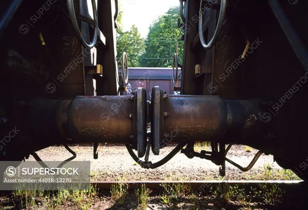 Linked railway transportation cars, close-up
