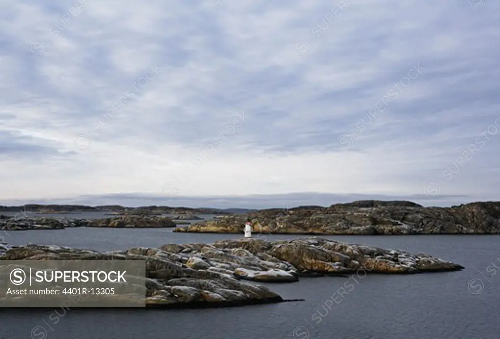 Remote lighthouse on rocks