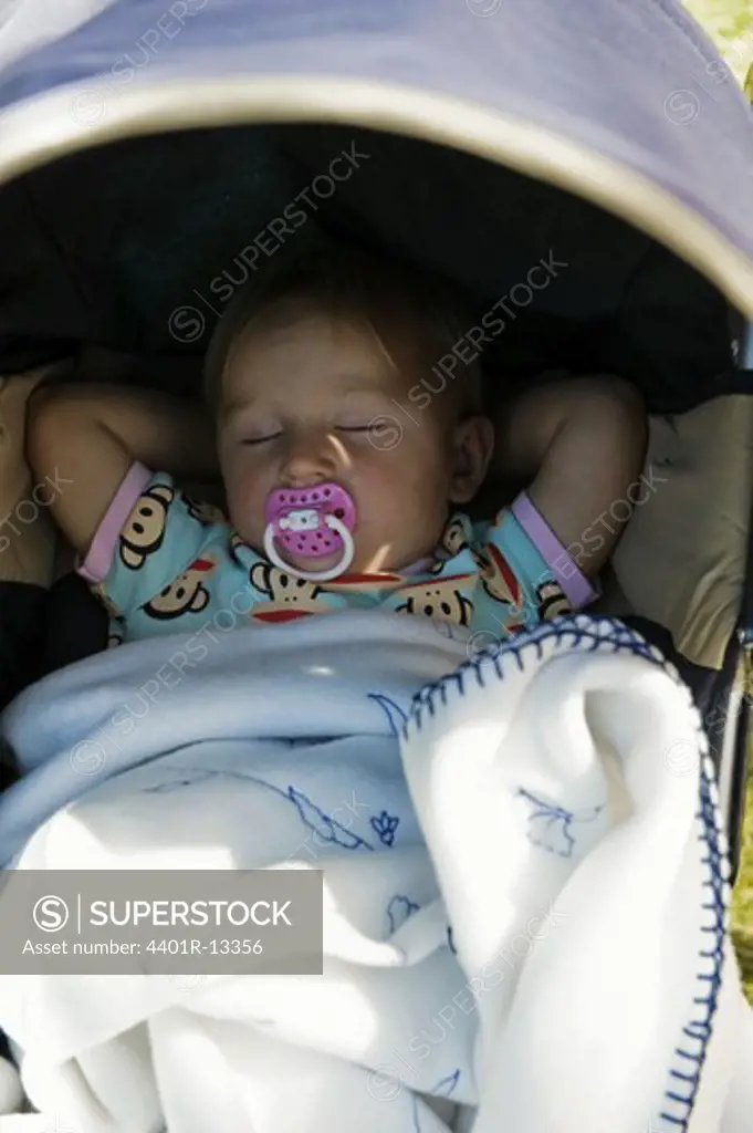 Baby sleeping in pram