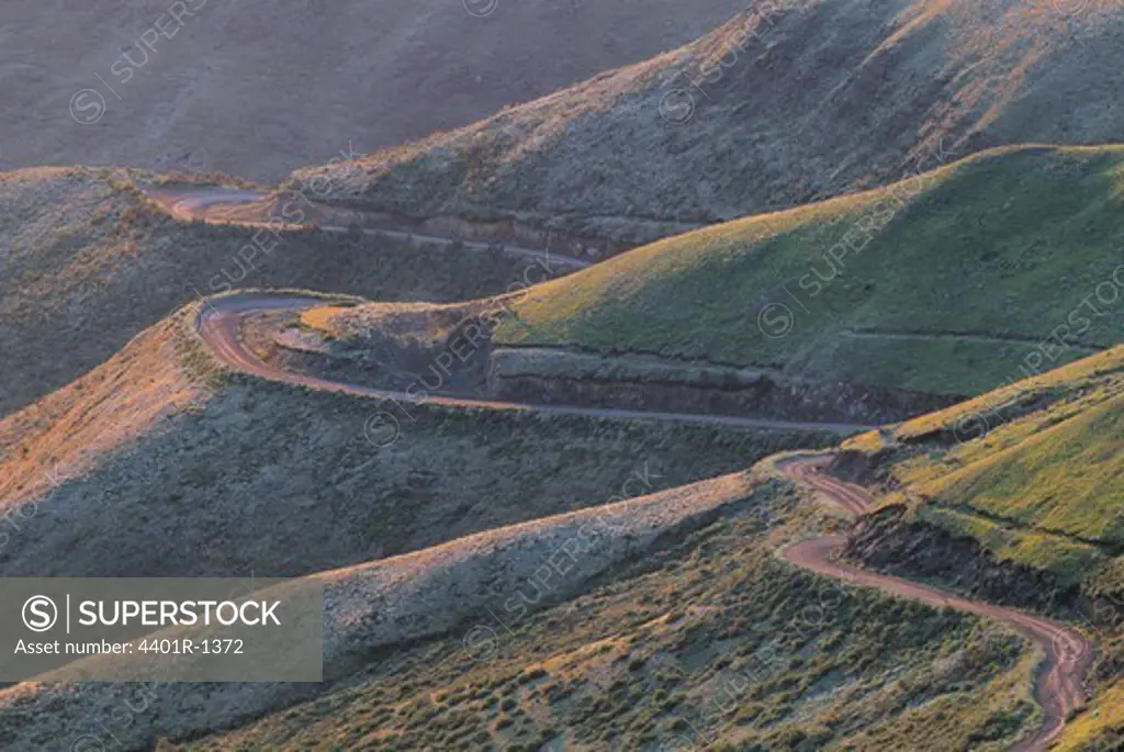 A long and winding road, Sani pass, Drakensbergen mountains, Drakensberg National Park, Lesotho and South Africa