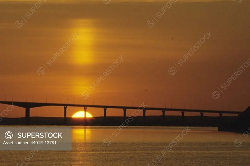 Silhouette of bridge at dawn