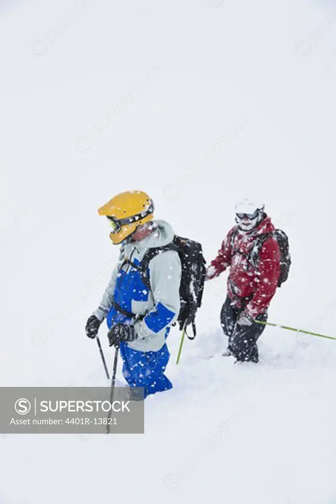 Two skiers in deep snow