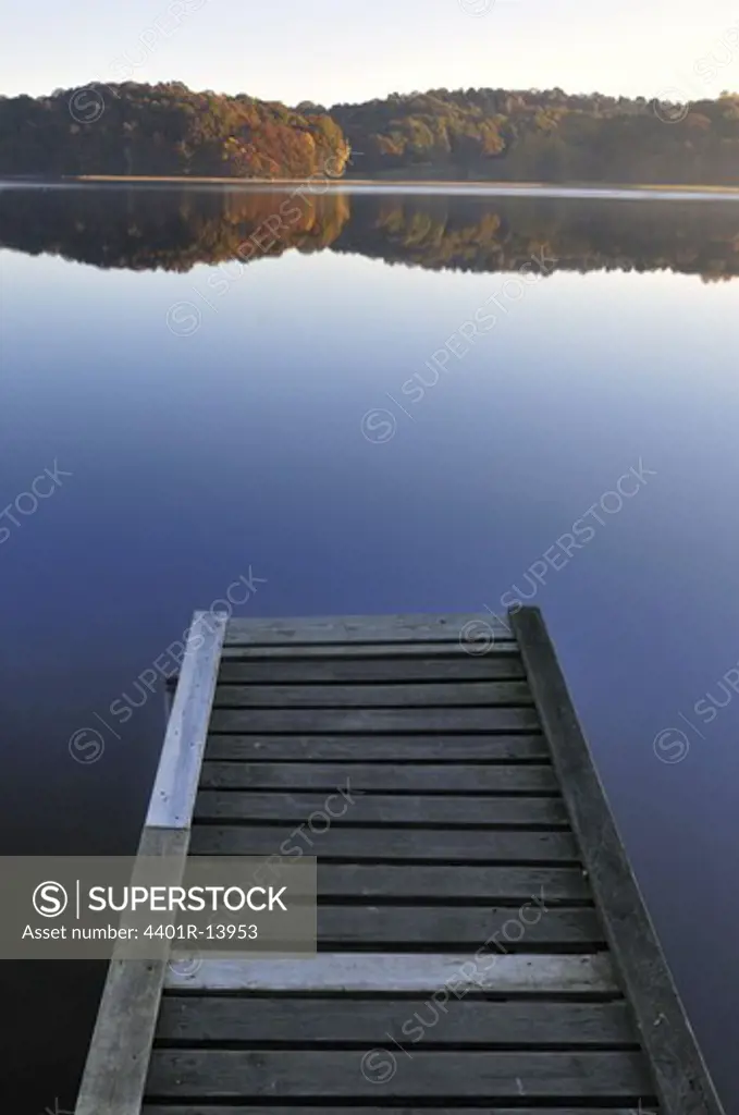 Wooden jetty on lake