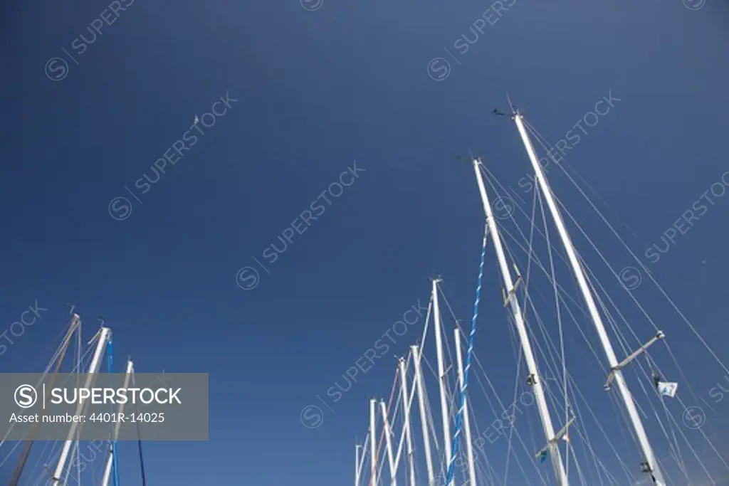 Boat sails against blue sky