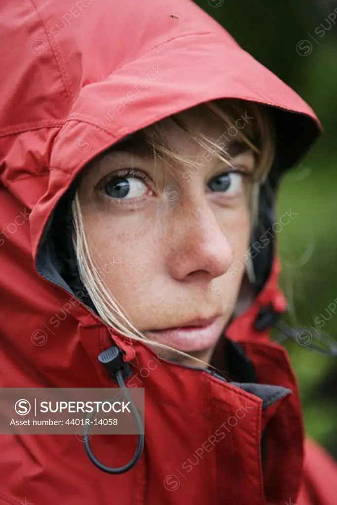 Woman wearing raincoat