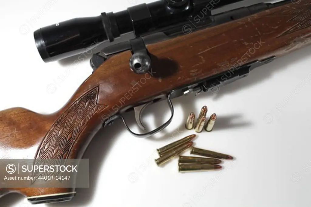 Close-up of riffle with bullets, studio shot