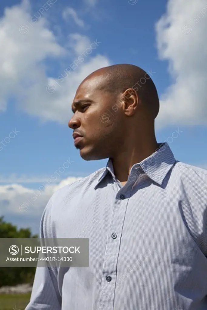 Portrait of man standing outdoors