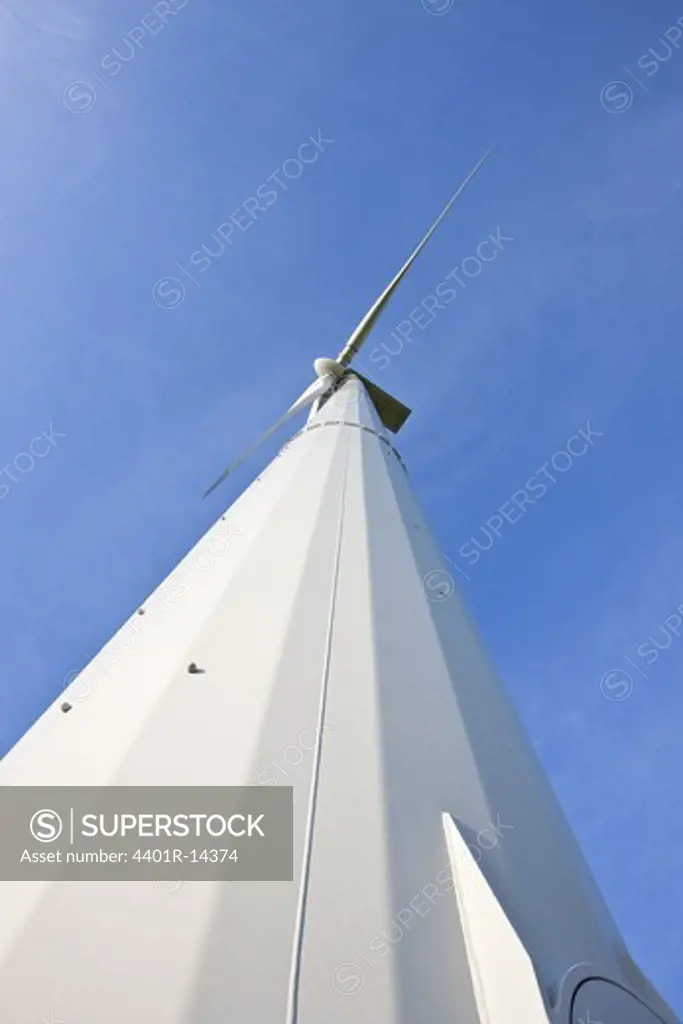 Low angle view of wind turbines