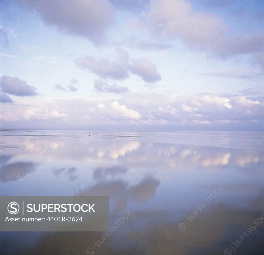 Reflection of sky and clouds on sea