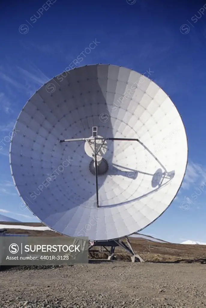Satellite dish on open land
