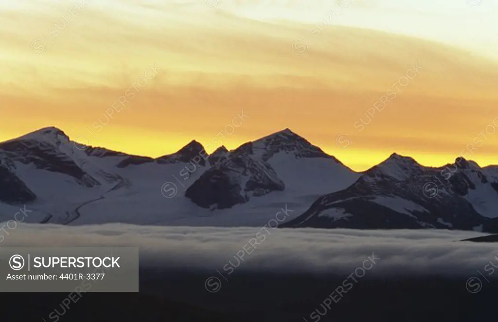 Snow-covered mountains against sky