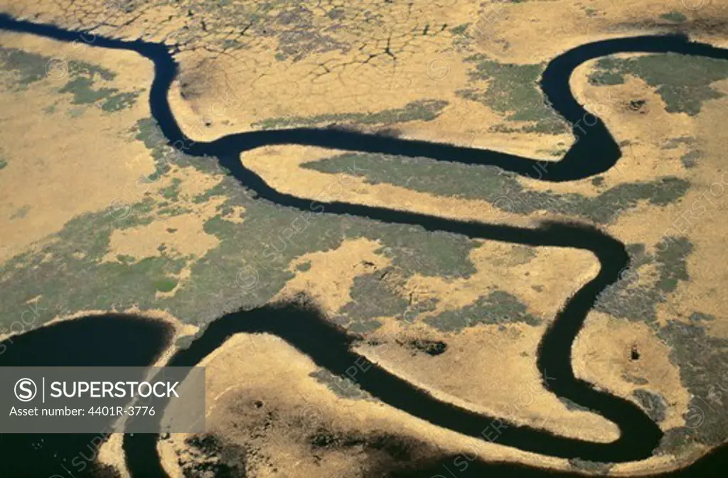 Meandering river through the tundra permafrost landscape
