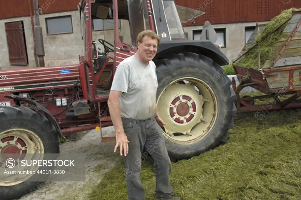 A farmer and a tractor, Sweden.