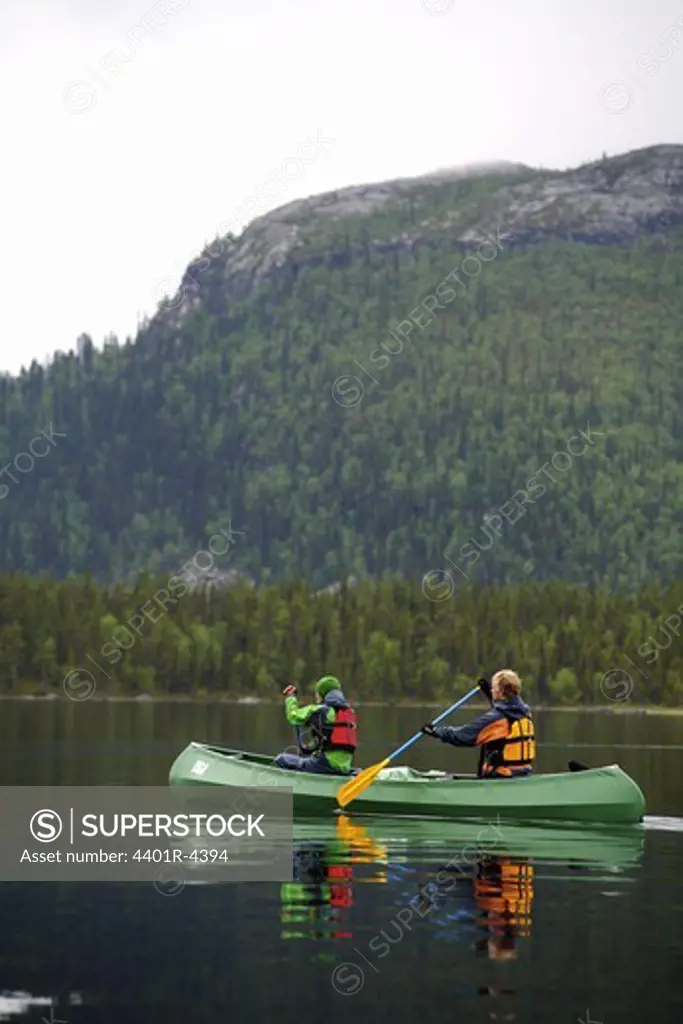 Canoeing in Lapland, Sweden.