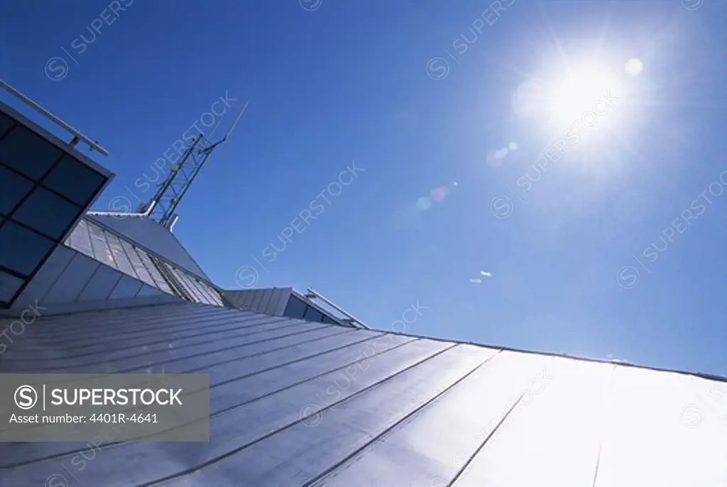 Sun over a tin roof, Sweden.