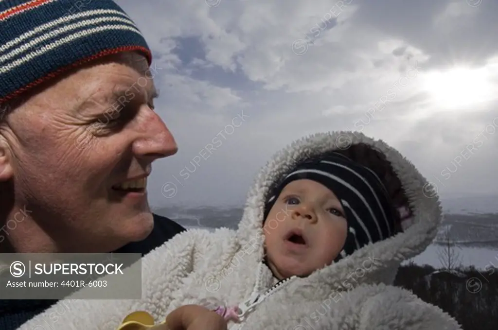 A grandfather with his grandson, Sweden.
