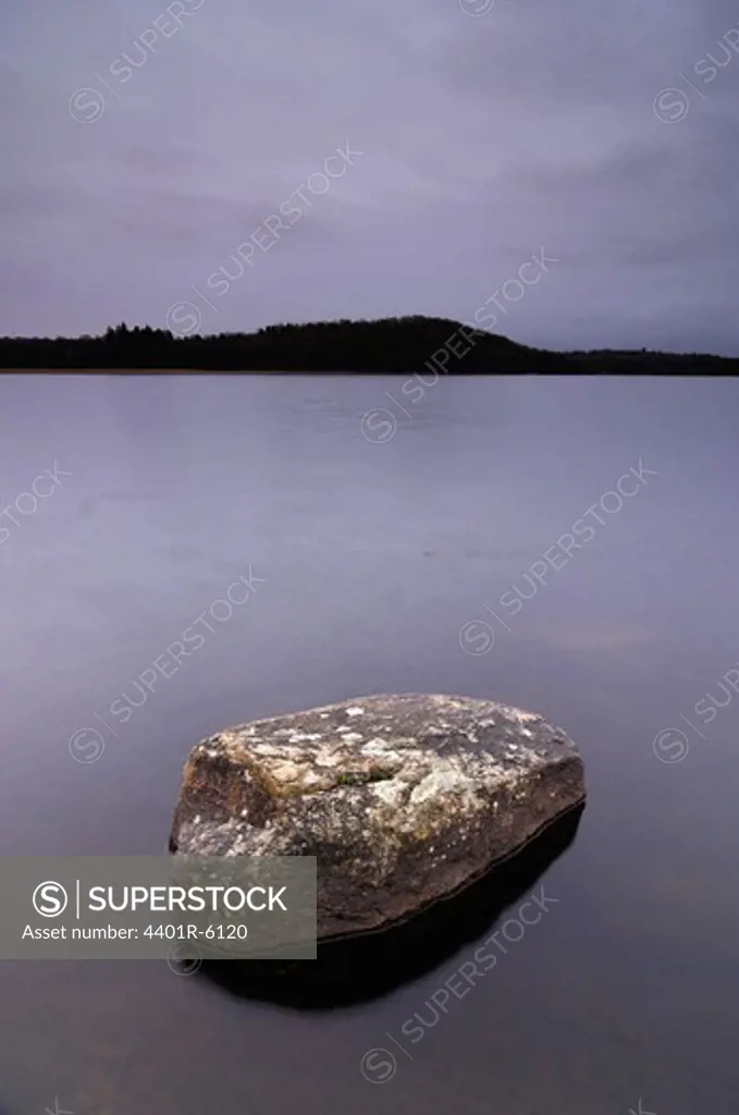 A rock in a lake, Sweden.