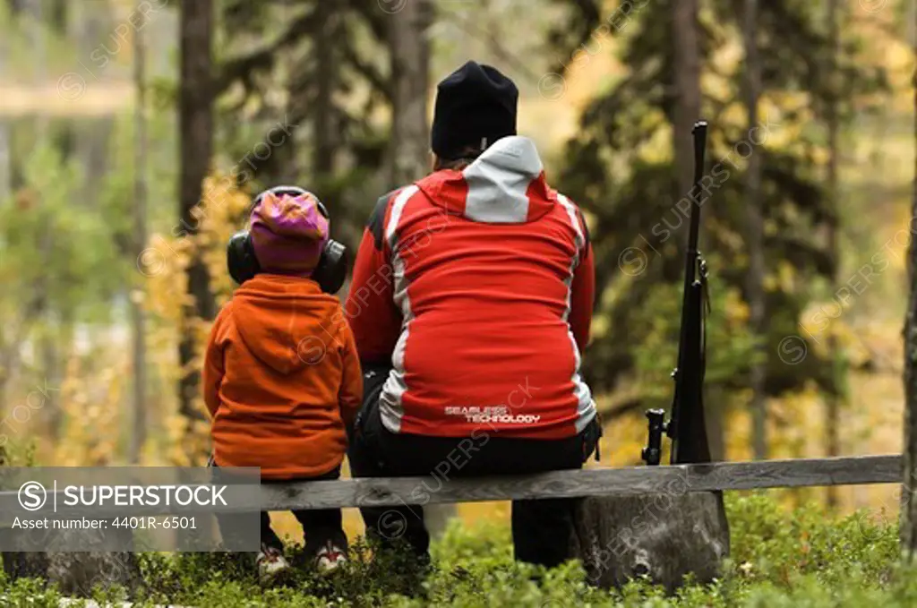 A woman and a child hunting, Sweden.