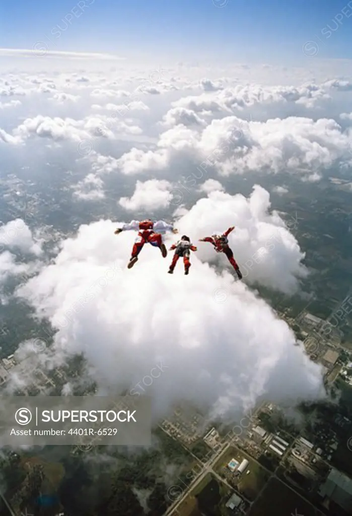 Three parachute jumpers, USA.