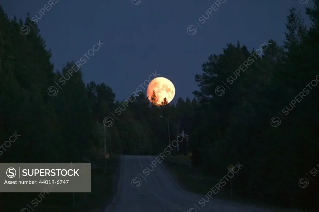 Fullmoon over a country road, Sweden.