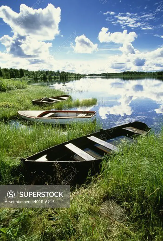 Rowing-boats in a lake, Lapland, Sweden.