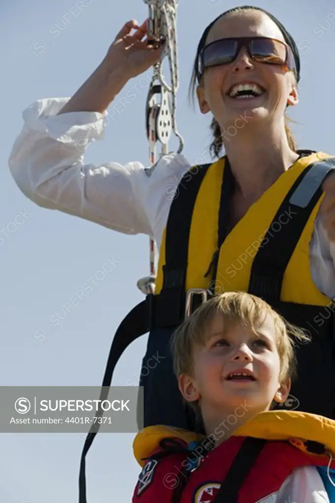 Mother and son on a sailing-boat, Sweden.