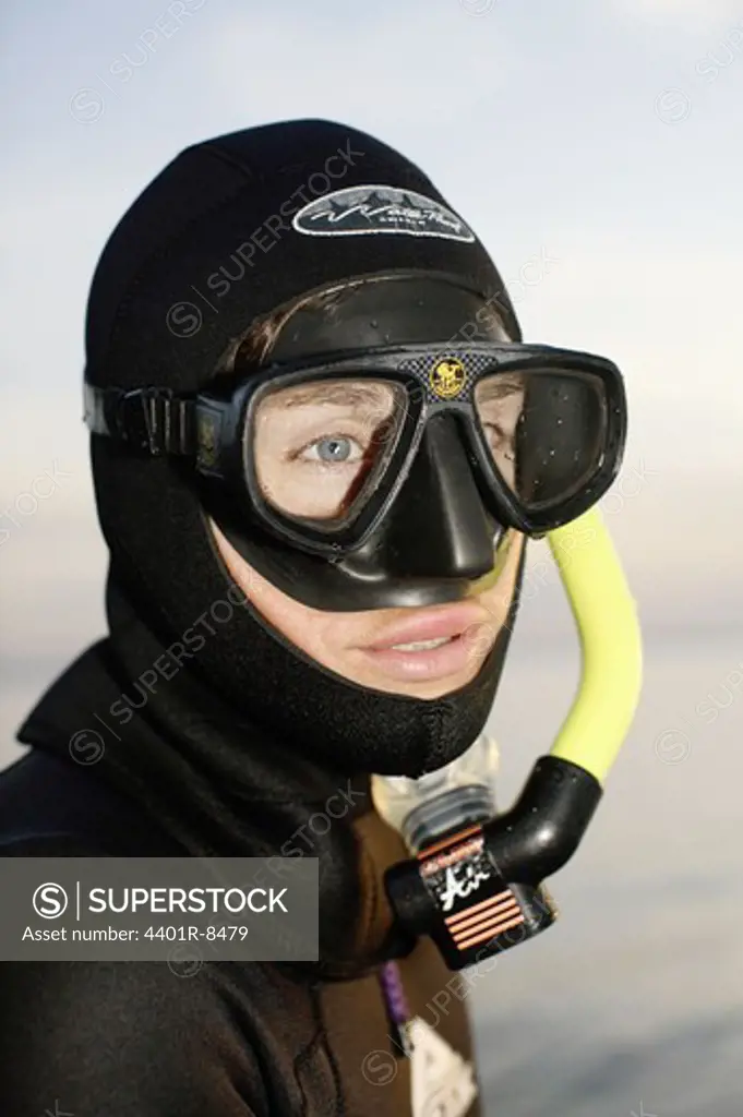A woman scuba diving, Sweden.