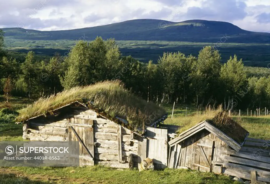 Shack with landscape in background