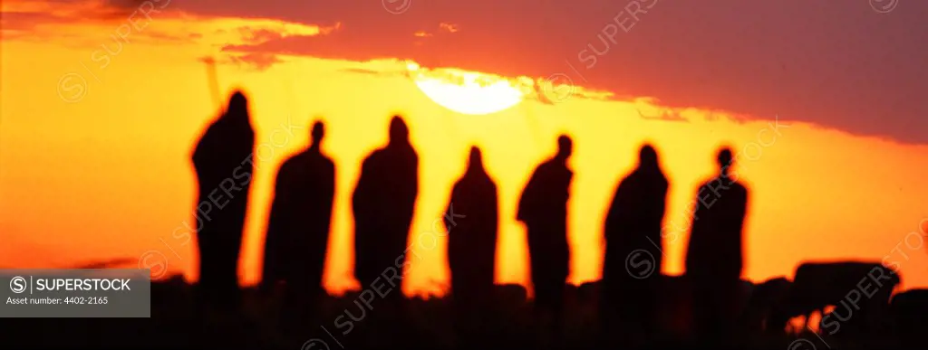 Maasai men at sunrise, Kenya