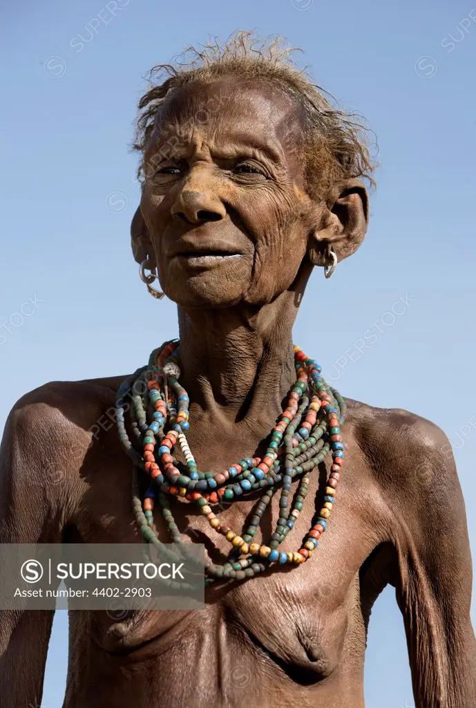 Portrait of an elderly woman of the Dassenech tribe. Omo Delta, Ethiopia, Africa.