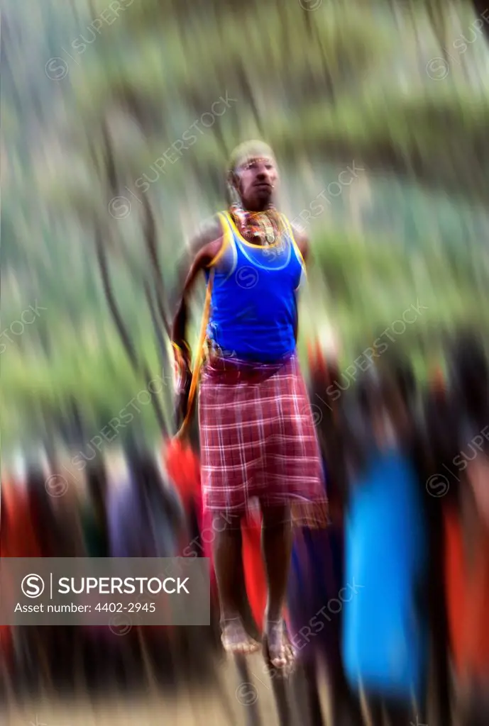 Samburu tribesman dancing to celebrate the mass circumcision of the young men of the tribe. Mount Nyiru, Kenya, Africa