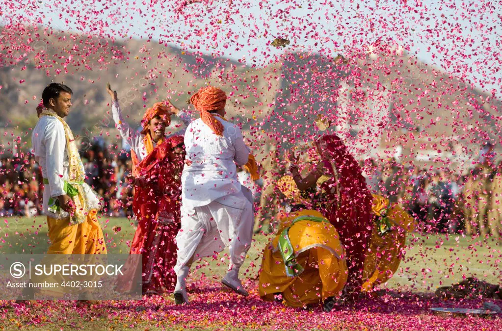People throwing coloured paper, Elephant festival, Jaipur.