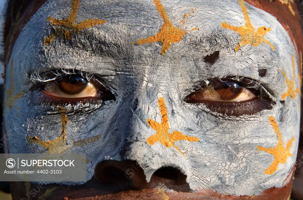 Suri woman with painted face, Omo Delta, Ethiopia.