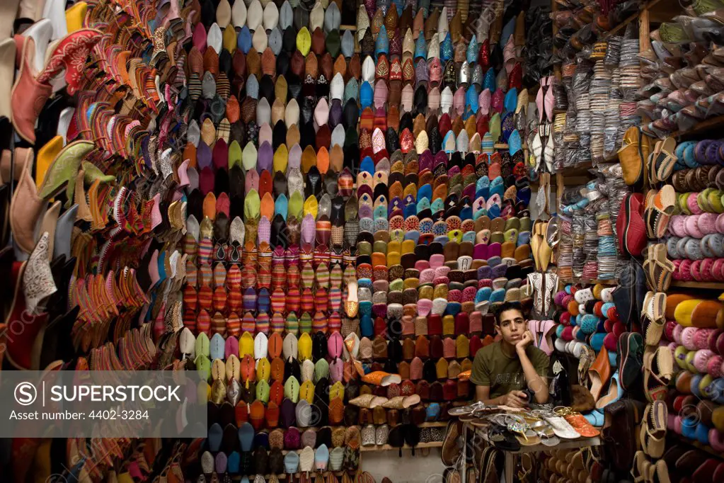Shoe seller in the Djemaa el Fna souq, Marrakech, Morocco