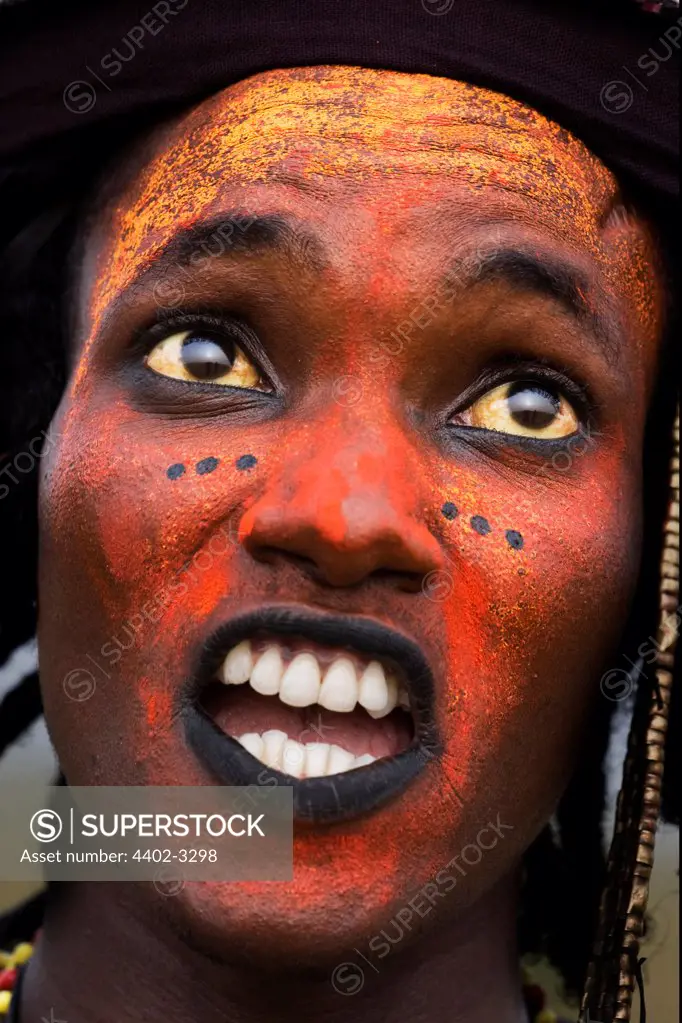 Wodaabe man performing for the tribeswomen during the Gerewol Festival, north of Abalak, Niger