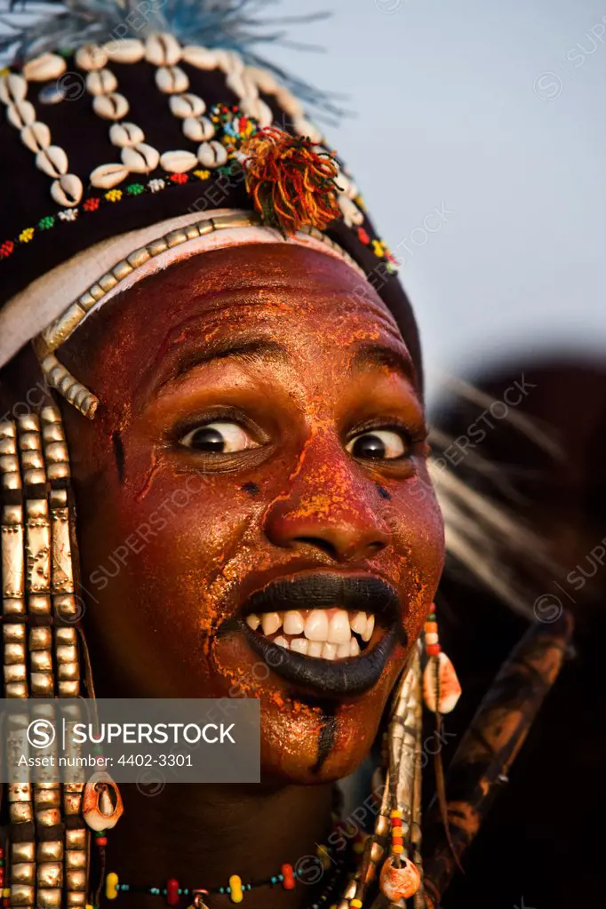 Wodaabe man performing for the tribeswomen during the Gerewol Festival, north of Abalak, Niger