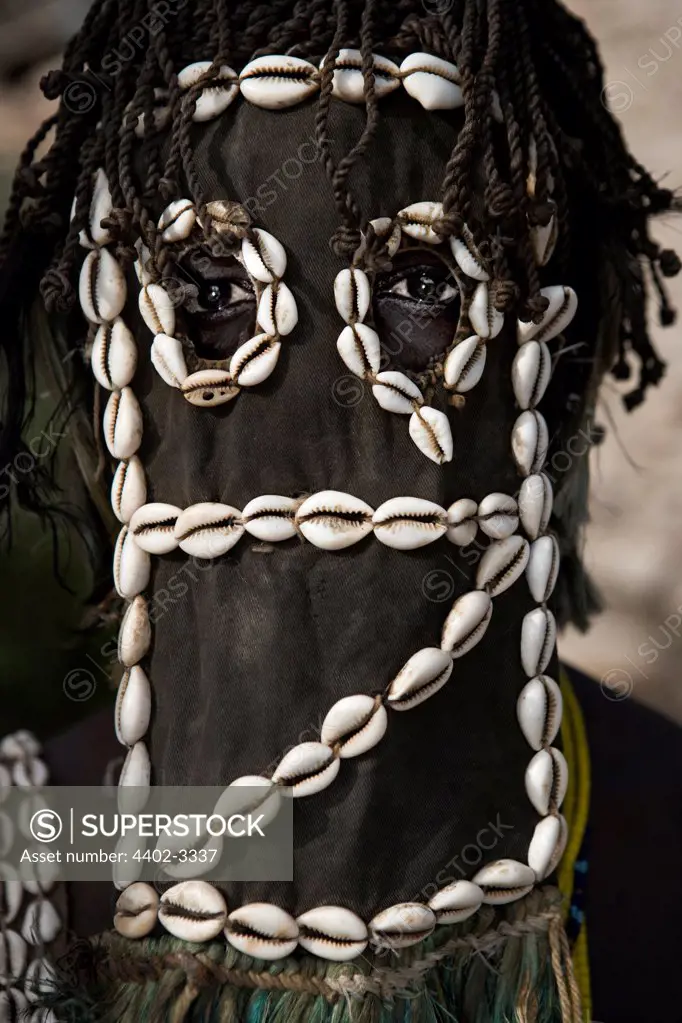 Masked Dogon dancer, Bandiagara Escarpment, Mali