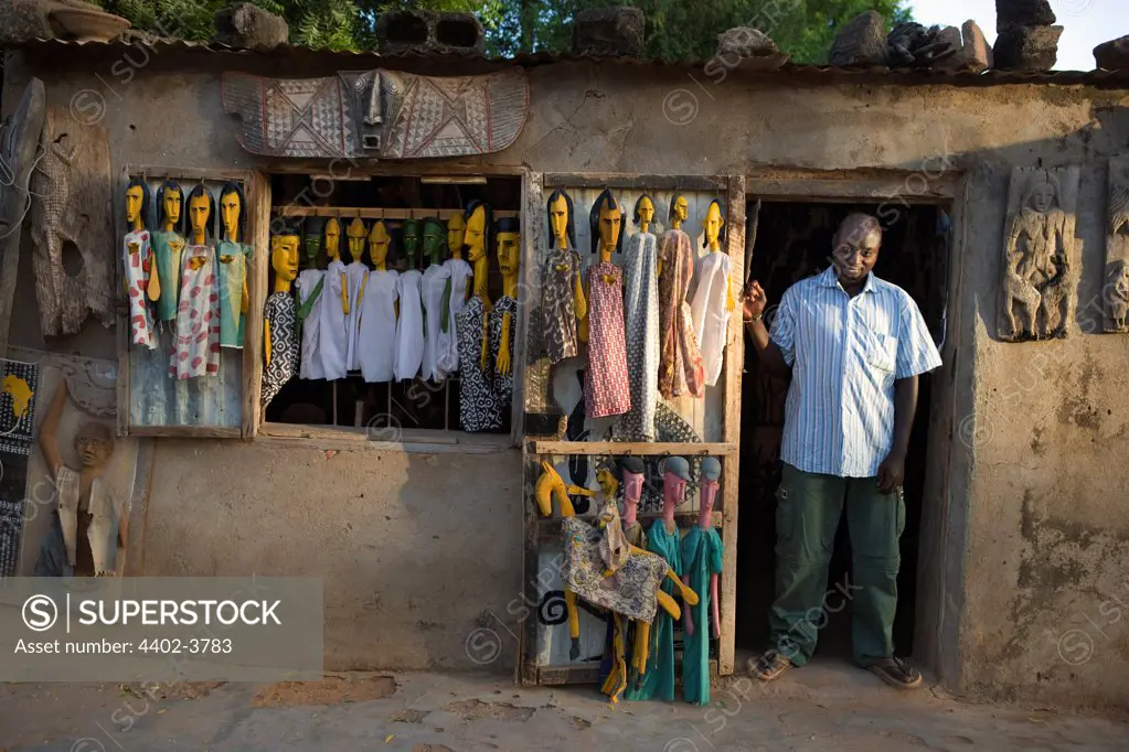 Man in the doorway to his shop in Sergou, Mali