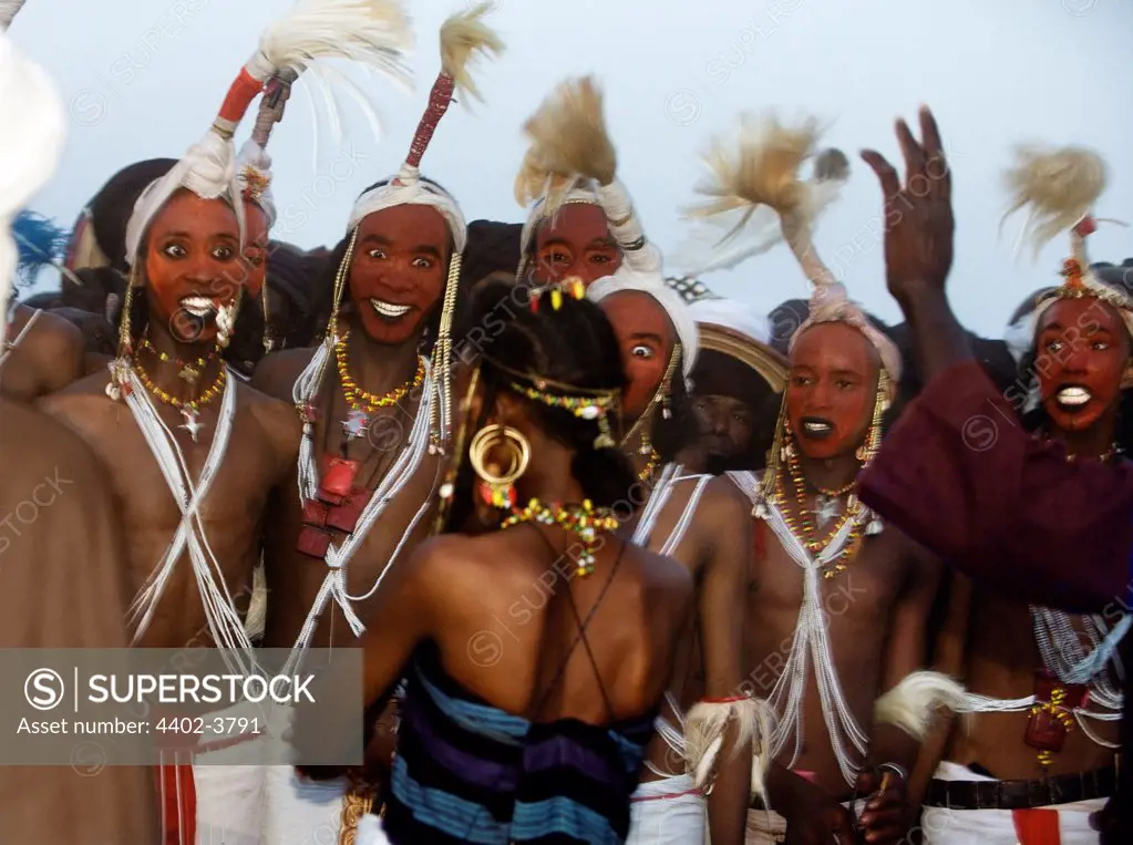 A Wodaabe girl chooses a partner from the dancing men at the Gerewol Festival, north of Abalak, Niger