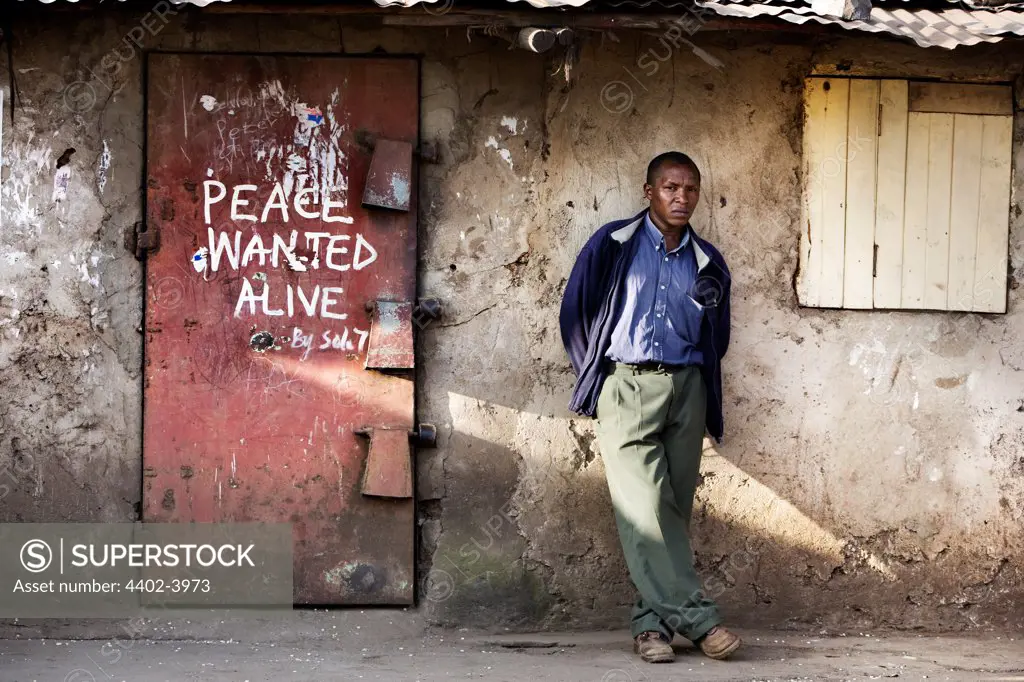 Shop door with slogan 'Peace wanted alive', Nairobi, Kenya.