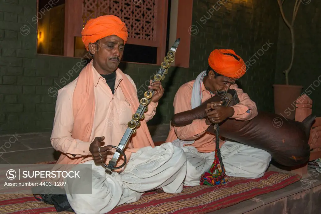 Muscicians playing Mask-Baja and Chimta instruments Sariska Rajasthan India