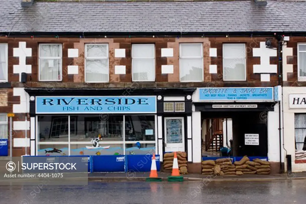 UK, Appleby-in-Westmorland, Flood defenses outside fish and chip shop