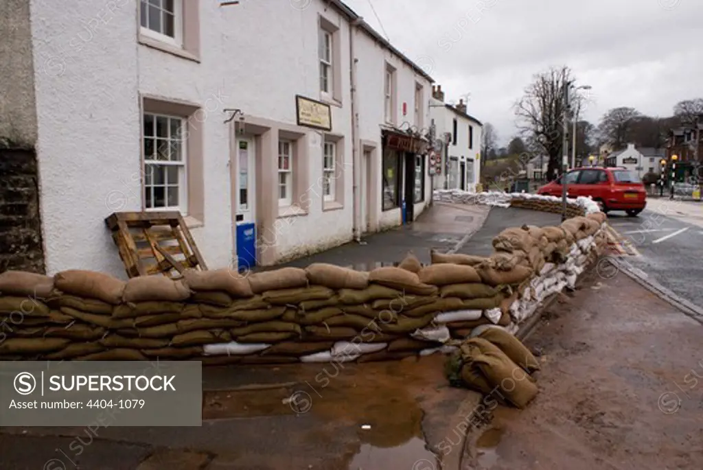 UK, Appleby-in-Westmorland, Flood defenses outside shops