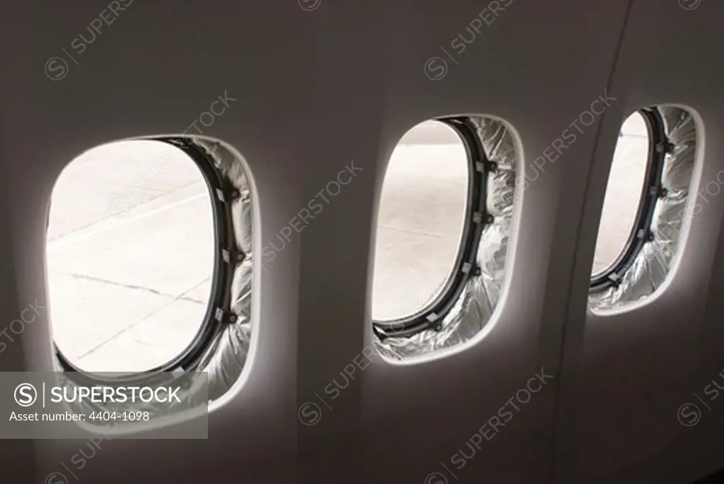 Aircraft windows showing insulation
