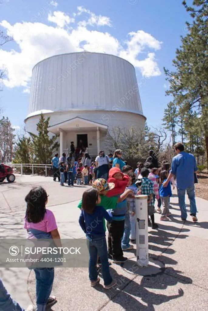 USA, Arizona, Flagstaff, School party visiting the 24-inch Clark refractor telescope at Lowell Observatory